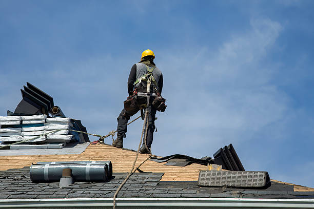 Professional Roof Replacement technician working in Chandler, IN